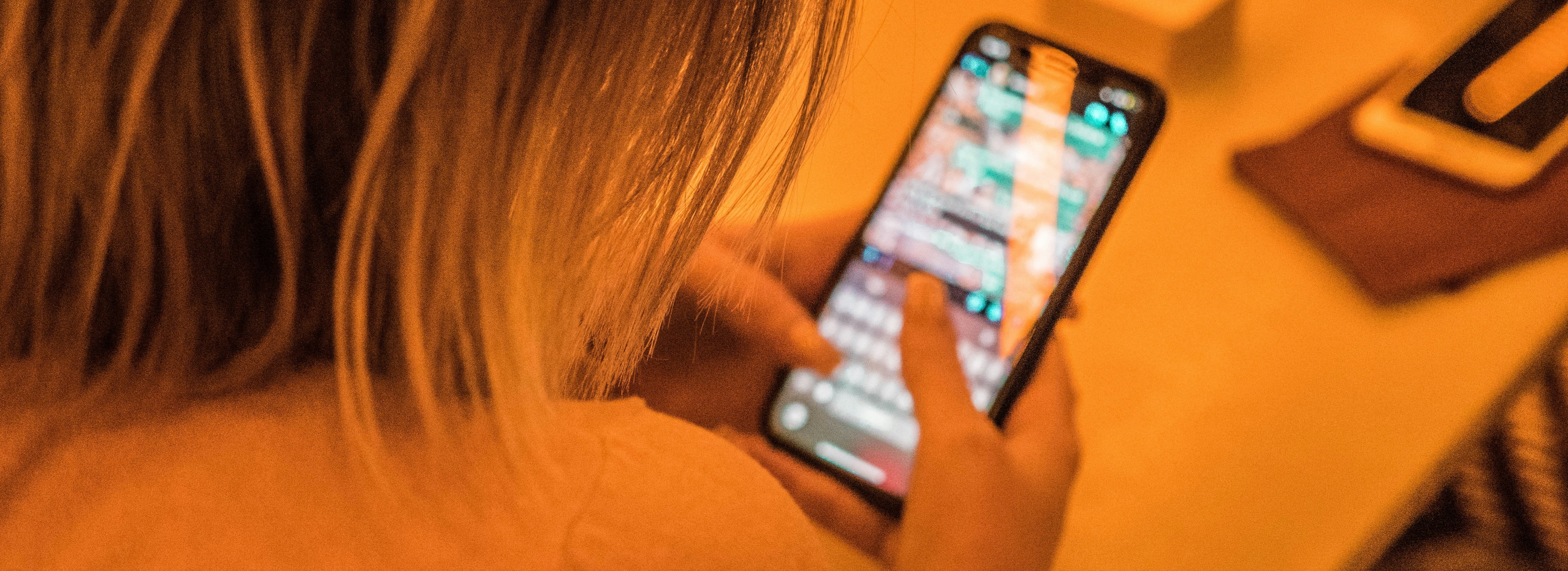 Woman holding a smartphone in her hand